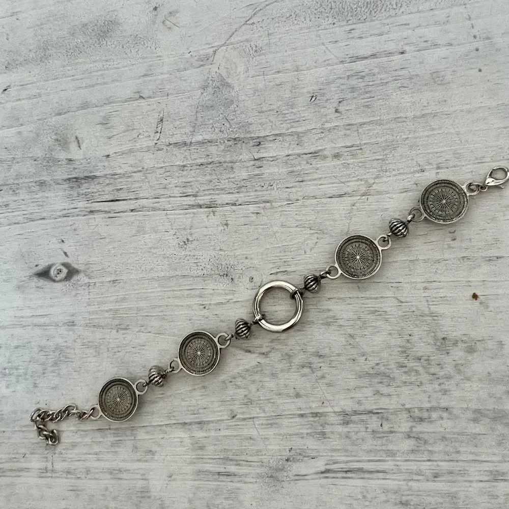 Silver tone white circle bracelet